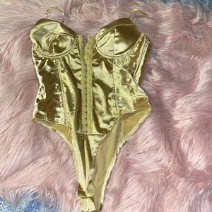 Gold body suit